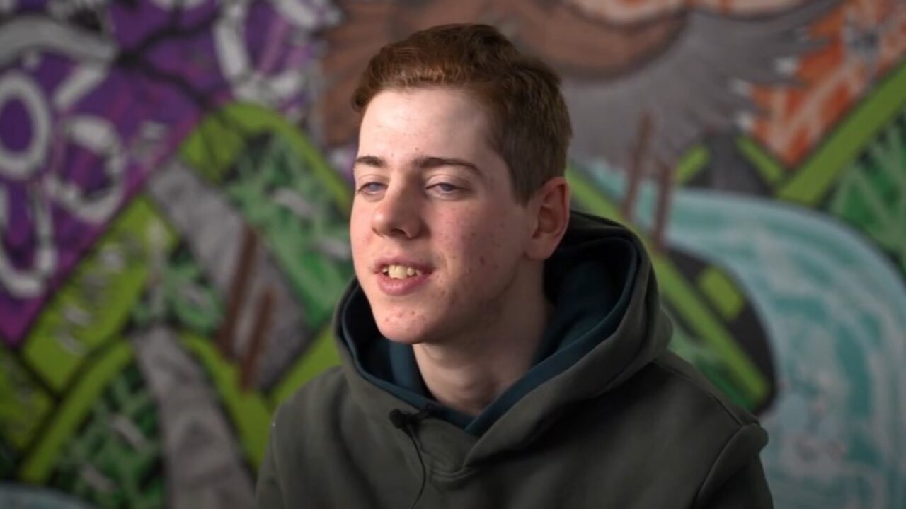 Photo of Patrick, a white person, talking to the camera.